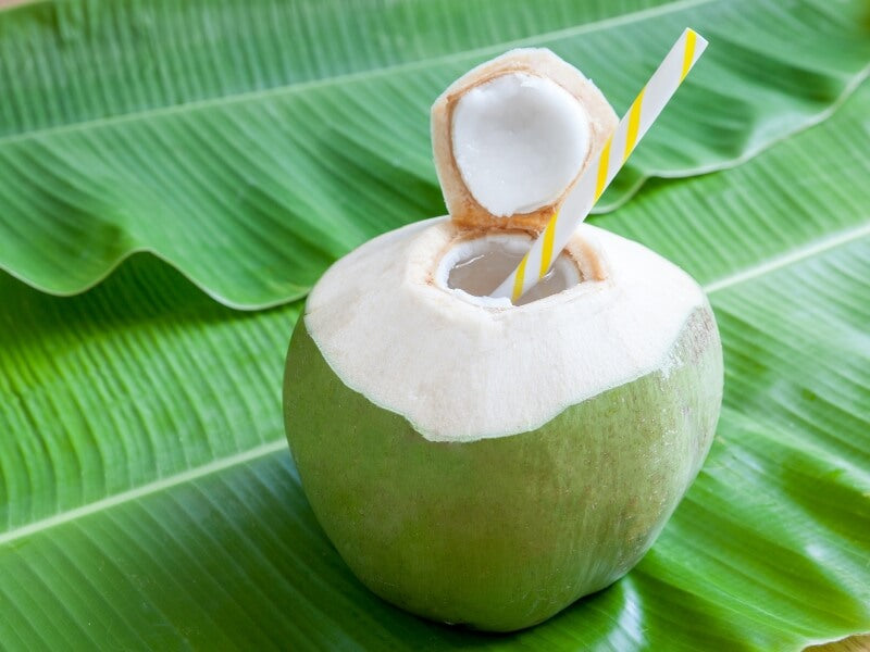 Coconut water with straw